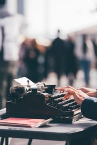 Writer hacks: a writer working on a typewriter