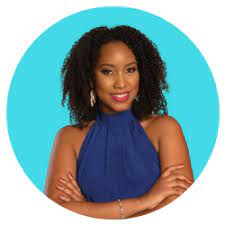 A woman with curly hair stands confidently, wearing a blue sleeveless top, with her arms crossed. The background is a bright turquoise circle.